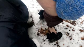 Beating her pussy in the snow
