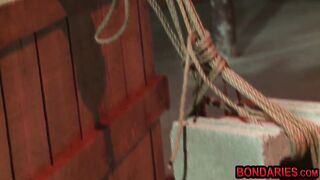 Hogtied teen gets anal torment with iron hook and fingers