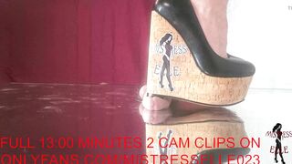 Mistress Elle tries out the new table with her wedges