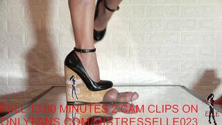 Mistress Elle tries out the new table with her wedges