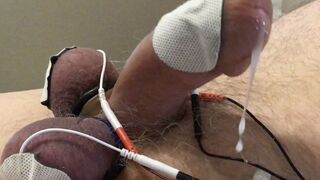 Long estim edging session with ball slapping brings out the cum