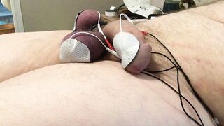 Long estim edging session with ball slapping brings out the cum