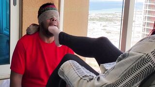 Worshiping mature lady feet while neighbors watch on balcony